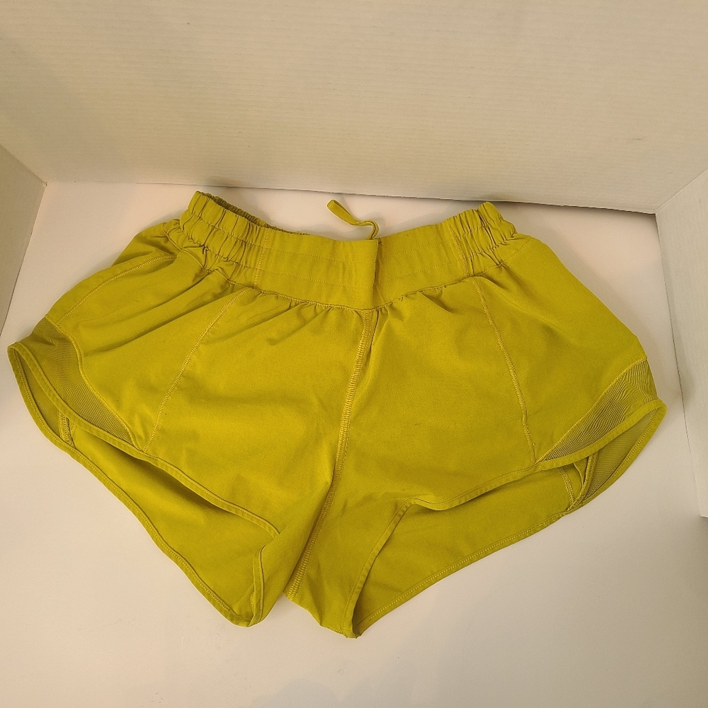 Lululemon size 6 hotty hot low rise gold/yellow shorts